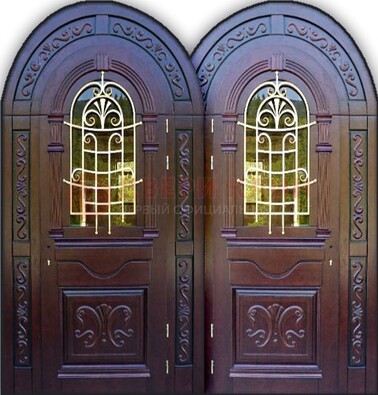 Индивидуальная арочная дверь со стеклом и ковкой ДА-19 в Подольске