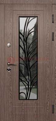 Металлическая дверь со стеклом и ковкой в стиле модерн ДСК-106 в Подольске