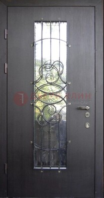 Остекленная стальная дверь с ковкой ДСК-26 в Подольске