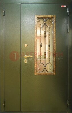 Стальная дверь со стеклом и ковкой ДСК-29 для квартиры в Подольске