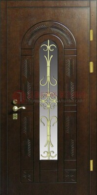 Дизайнерская металлическая дверь со стеклом и ковкой ДСК-50 в Саранске