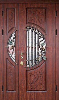 Железная дверь с виноритом и стеклом с ковкой ДВТ-170 в Подольске